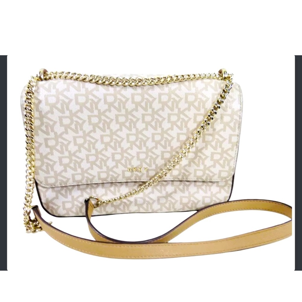 DKNY Cross Body Bag (10"x7"x3.5") white with DKNY logo. New without tags.